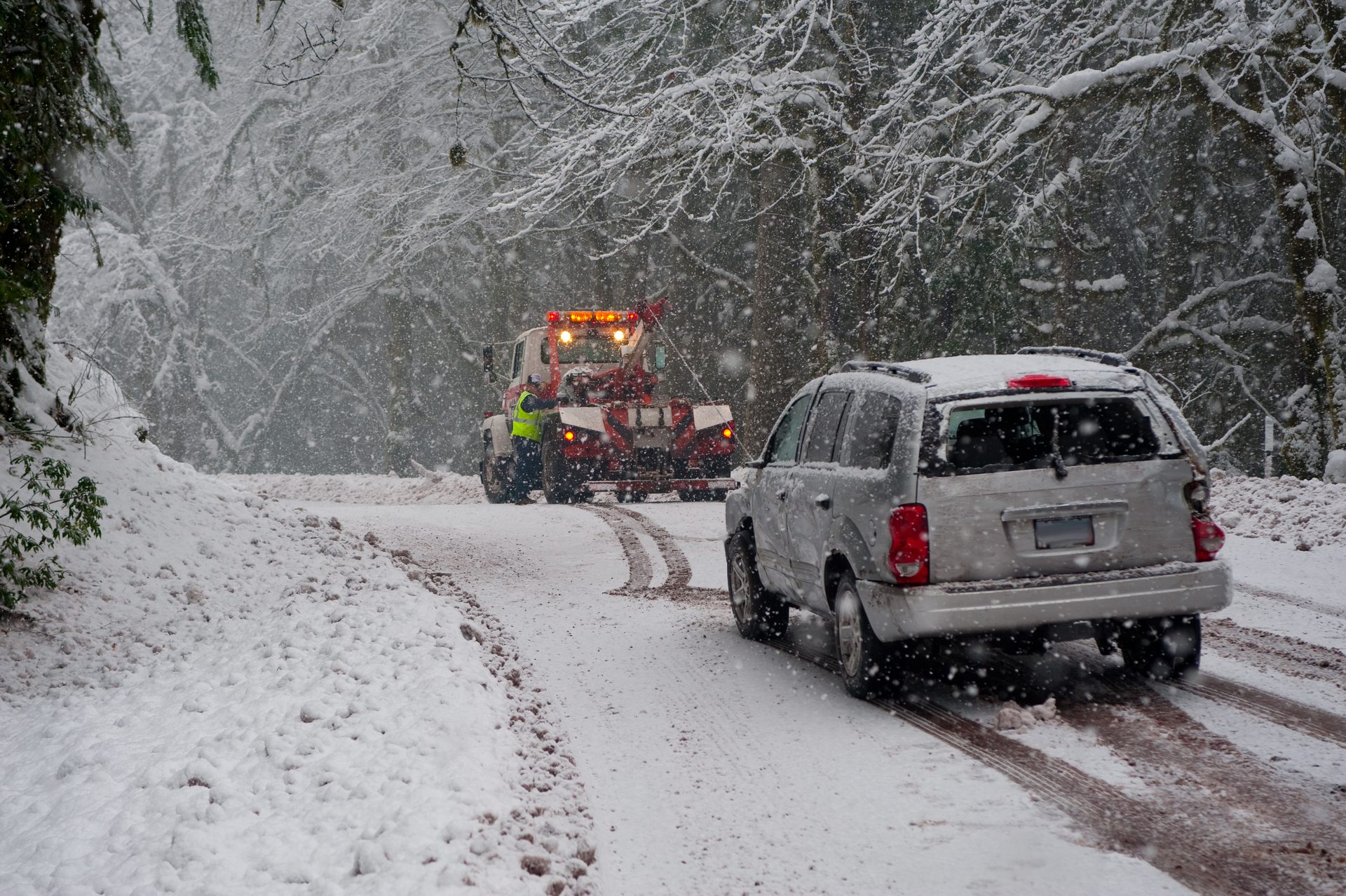 Tow truck working in a snowstorm